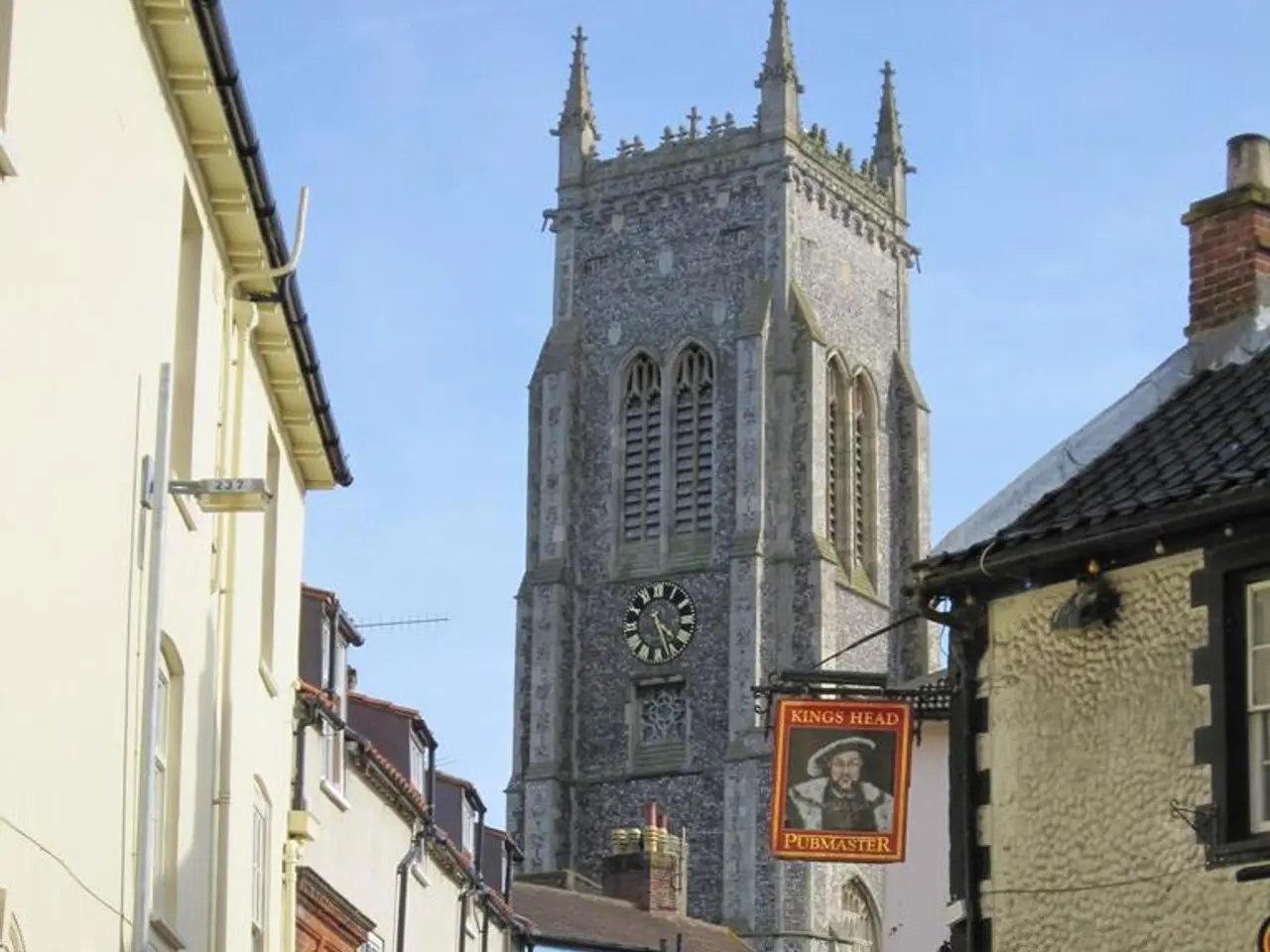 This image consists of many buildings. At the bottom, there is a road. In the front, we can see...